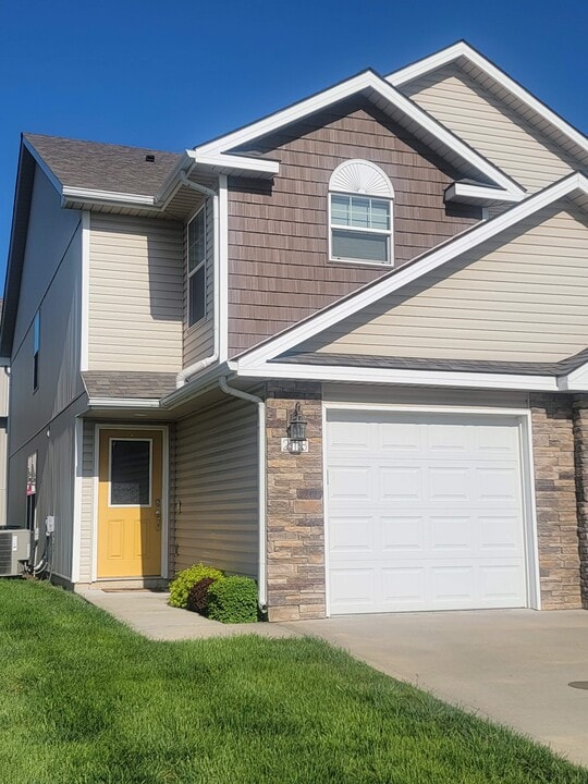 218 N Washington St in Raymore, MO - Building Photo