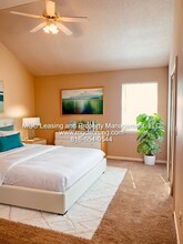 1005C NE Whispering Winds Cir in Lee's Summit, MO - Building Photo - Building Photo