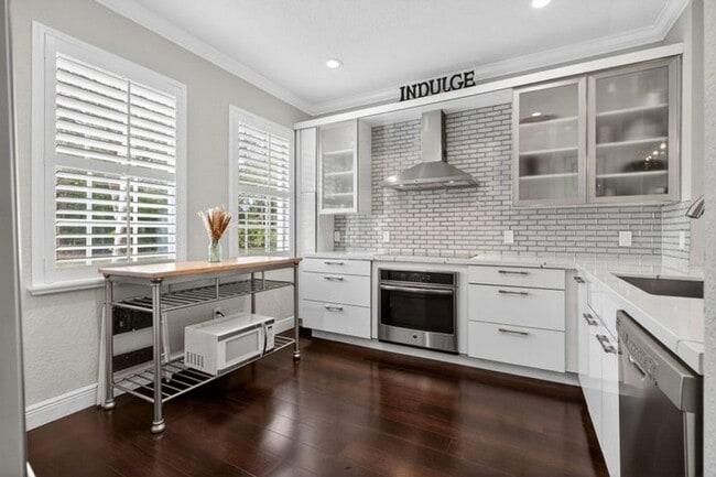 203 E Thatch Palm Cir