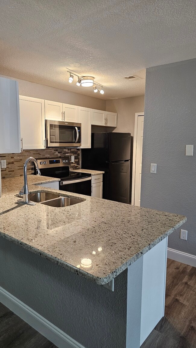 8800 Latrec Ave, Unit 107 in Orlando, FL - Foto de edificio - Building Photo