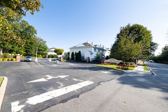 Village Estates in Amityville, NY - Building Photo - Building Photo