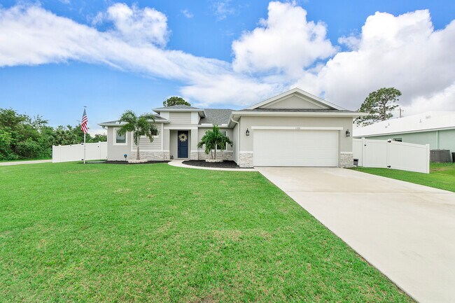 property at 1102 SW Calmar Ave