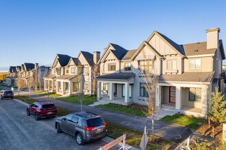 Homes by Avi - Wildflower at Springbank Hill in Calgary, AB - Building Photo - Building Photo