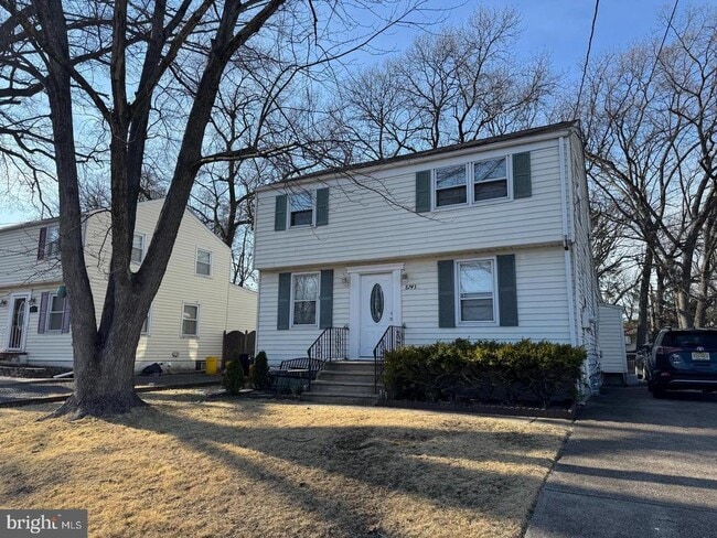 property at 8743 Orchard Ave