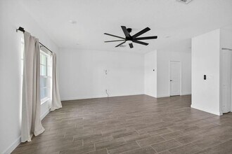 1407 Tangled Orchard Tr in Loxahatchee, FL - Building Photo - Building Photo