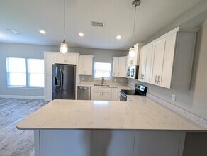 2219 Wind Trace Rd N in Navarre, FL - Foto de edificio - Building Photo