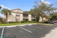 4498 Carambola Cir N in Coconut Creek, FL - Building Photo - Building Photo