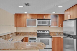 201 Golden Isles Dr in Hallandale Beach, FL - Building Photo