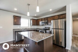 210 Elissa Dr in Raymore, MO - Building Photo - Building Photo