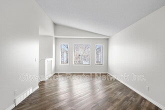 119 Cimarron Grove Crescent in Okotoks, AB - Building Photo - Building Photo