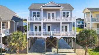 1708 W Dolphin Dr in Oak Island, NC - Building Photo