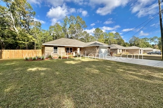 6762 Trailride N in Milton, FL - Building Photo - Building Photo
