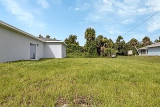 924 Tropical Ave NW in Port Charlotte, FL - Building Photo - Building Photo