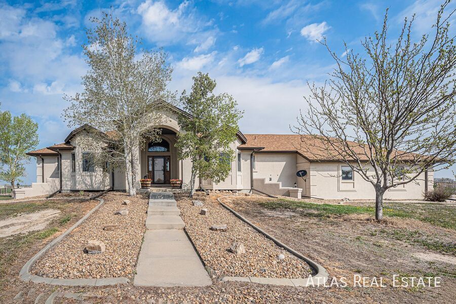 14219 Co Rd 22 in Fort Lupton, CO - Building Photo