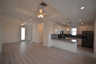 8581 Agate St, Unit 03-21 in Port Charlotte, FL - Building Photo - Building Photo