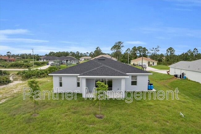 382 Poplar St in Lehigh Acres, FL - Building Photo - Building Photo