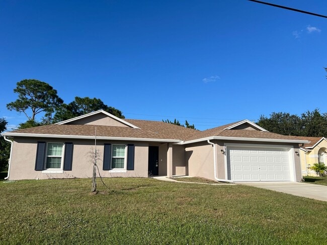 5951 NW Baynard Dr in Port St. Lucie, FL - Building Photo - Building Photo