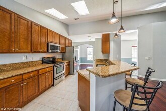 5493 NW Evanston Ave in Port St. Lucie, FL - Building Photo - Building Photo