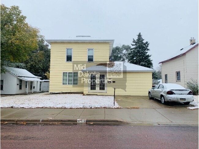 property at 416 E 1st Ave