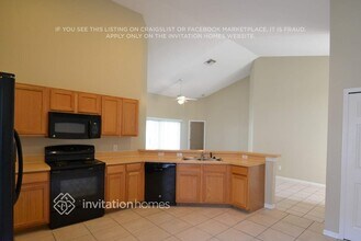 1124 Cedarwood Way in Clermont, FL - Foto de edificio - Building Photo