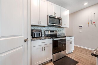 1645 Lindley St in Mangonia Park, FL - Building Photo - Building Photo