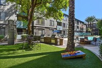 Cornhole and Outdoor Grills at the Pool - Monte Viejo Apartments in Phoenix, Arizona