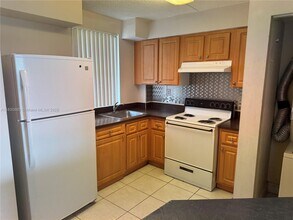6045 NW 186th St in Miami Gardens, FL - Building Photo - Building Photo