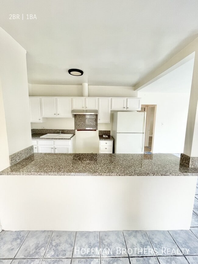 2838 W Vernon Ave in Los Angeles, CA - Building Photo - Building Photo