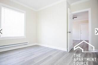 648.5 W Roscoe St, Unit 1 in Chicago, IL - Foto de edificio - Building Photo