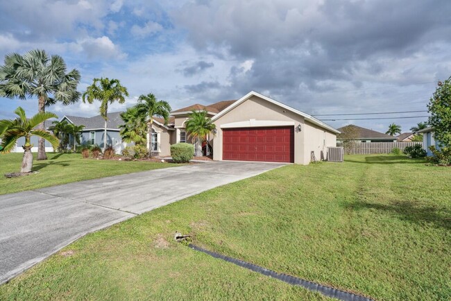 1891 SW Lewis St in Port St. Lucie, FL - Building Photo - Building Photo