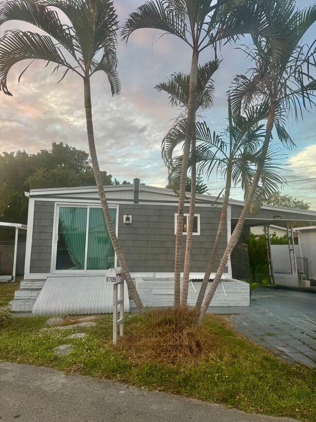 property at 8709 SW 15th St