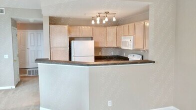 8707 E Florida Ave-Unit -UNIT 402 in Denver, CO - Building Photo - Building Photo