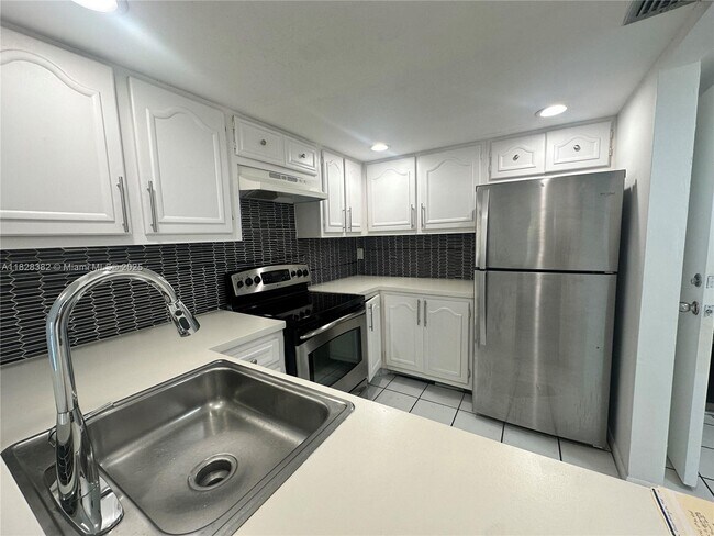 property at 13685 NE 10th Ave