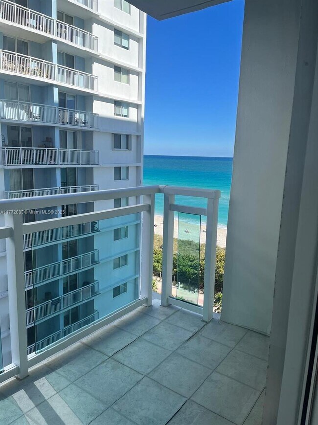 property at 6917 Collins Ave
