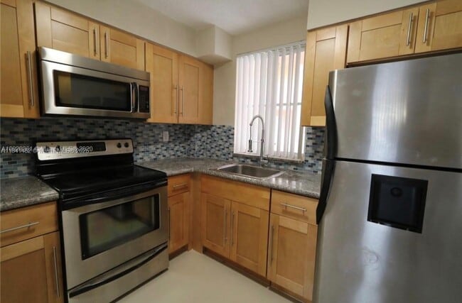 property at 6045 NW 186th St