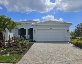 1595 Tavira Pl in Englewood, FL - Building Photo