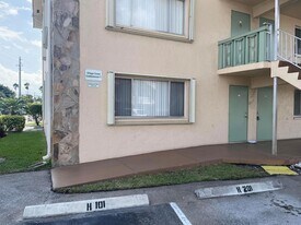 700 Village Green Ct, Unit H101 in Palm Springs, FL - Building Photo
