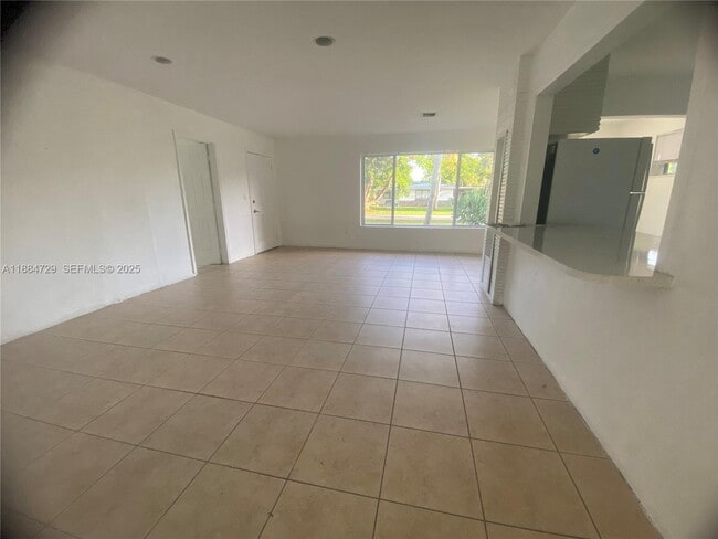 property at 4557 NW 3rd St