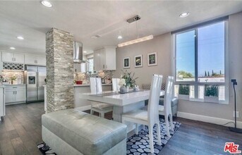 150 N Almont Dr-Unit -203 in Beverly Hills, CA - Building Photo - Building Photo