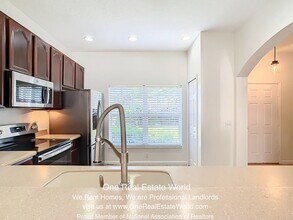 9155 Hunters Mill Dr in Orlando, FL - Building Photo - Building Photo