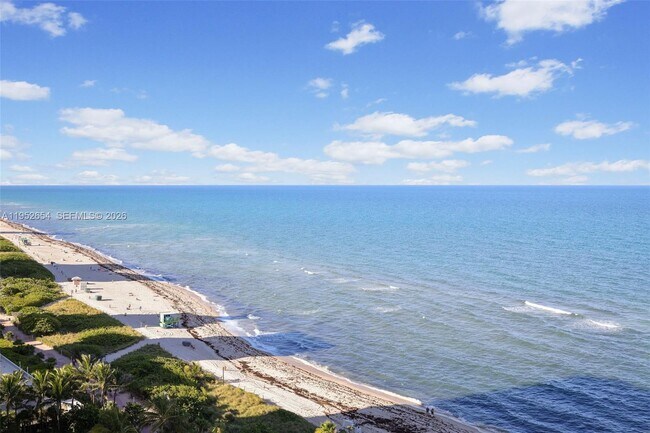 property at 6899 Collins Ave