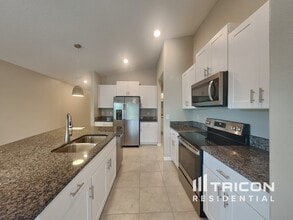 7013 Gomez Rocks Ct in Sun City Center, FL - Building Photo - Building Photo