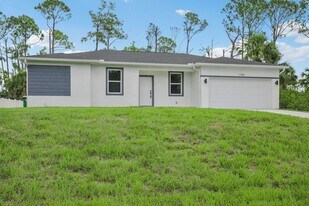 11992 Atoll Ave in Port Charlotte, FL - Building Photo
