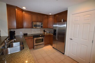 7651 Whisper Way-Unit -203 in Kissimmee, FL - Building Photo - Building Photo