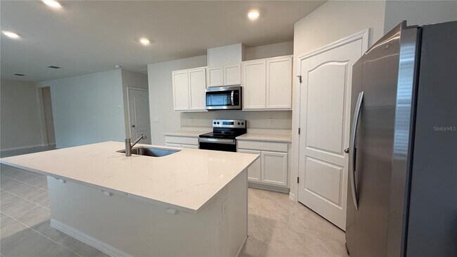 3314 Pine Lily Ave in Poinciana, FL - Foto de edificio - Building Photo