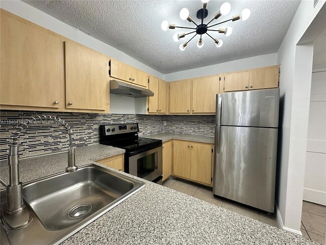 property at 13685 NE 10th Ave