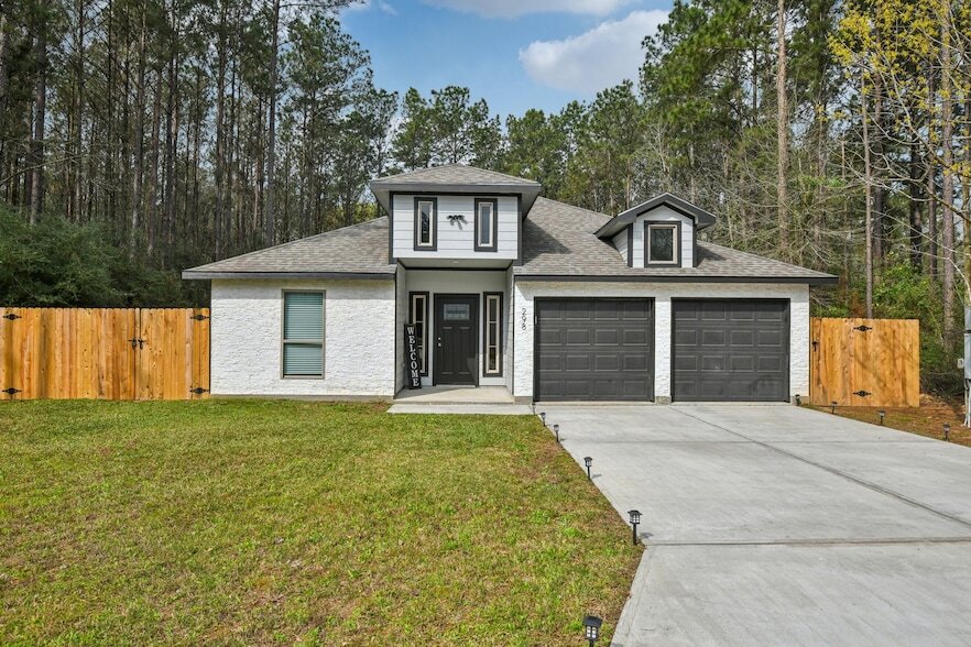 298 Rd 3545 in Cleveland, TX - Building Photo