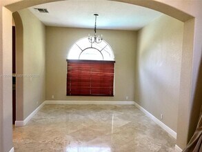 7477 NW 114th Terrace in Parkland, FL - Foto de edificio - Building Photo