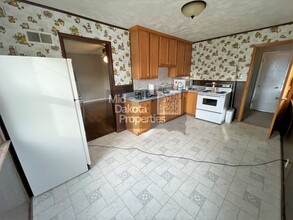 1000 W 3rd Ave in Mitchell, SD - Building Photo - Building Photo