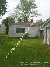 1909 McPhail St in Flint, MI - Building Photo - Building Photo